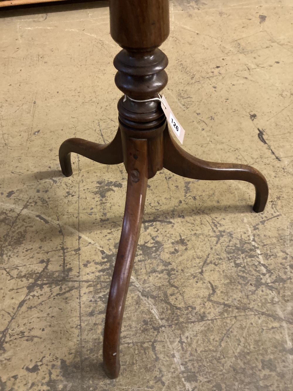 A Regency mahogany tilt top wine table, the rectangular top with re-entrant corners, width 53cm depth 40cm height 73cm